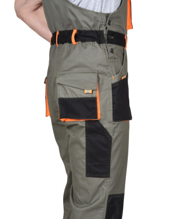 Полукомбинезон Манхеттен, цв. оливковый с оранжевым и черным от магазина Рабочий класс