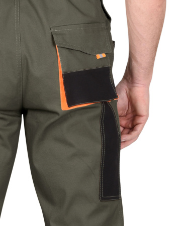 Полукомбинезон Манхеттен, цв. оливковый с оранжевым и черным от магазина Рабочий класс